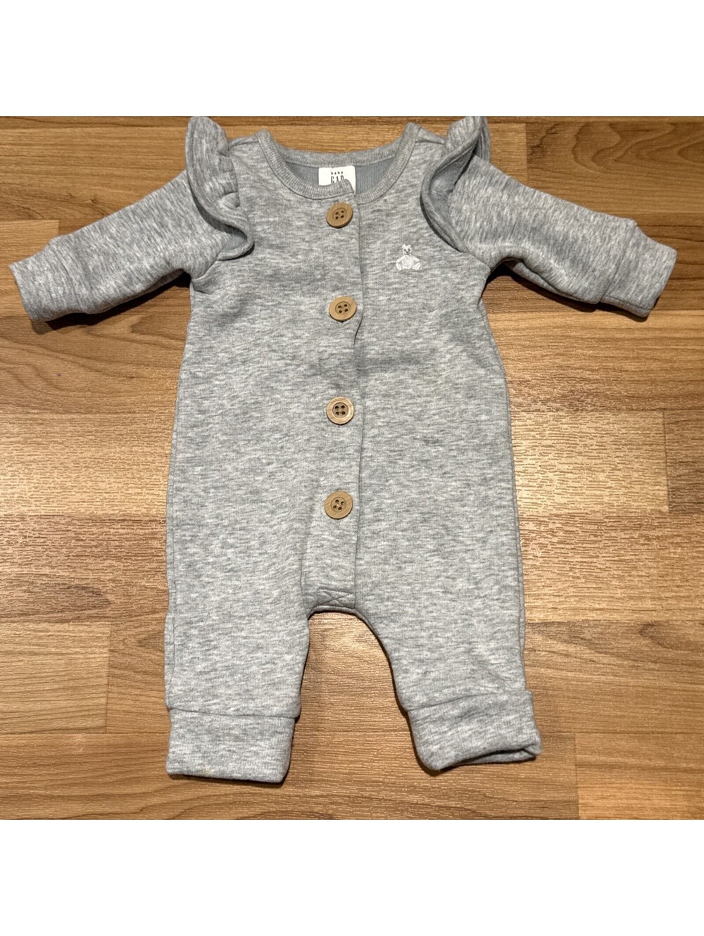 Girls gray Ruffle romper size 0/3 months by baby gap. adorable!